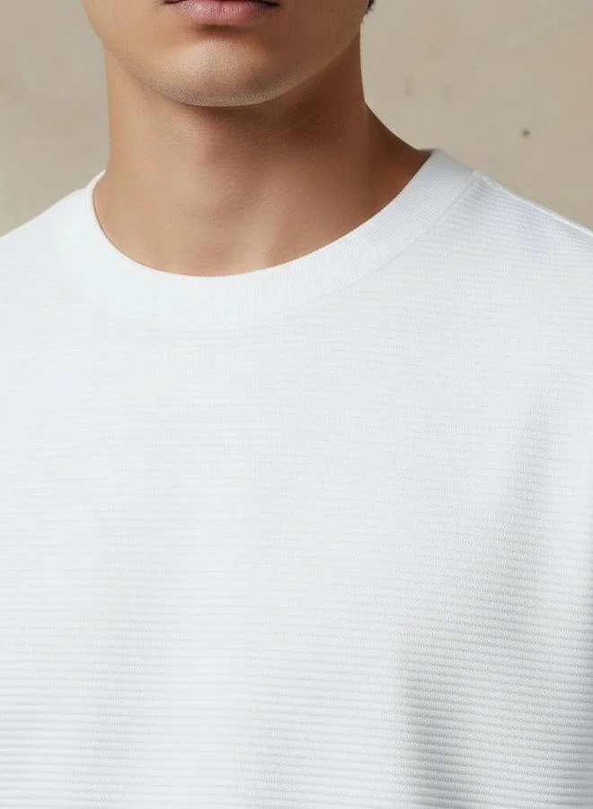 Lee Cooper  Lee Cooper Men Relaxed Fit Crew Neck Short Sleeves Ribbed T-shirt for Men | Best Price UAE